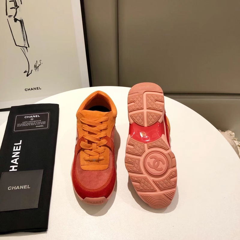 Ch*el suede calfskin sneakers in orange/red