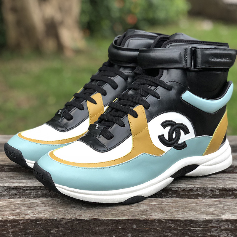 Ch*el calfskin & velvet high top sneaker inblack, light yellow, white & light blue