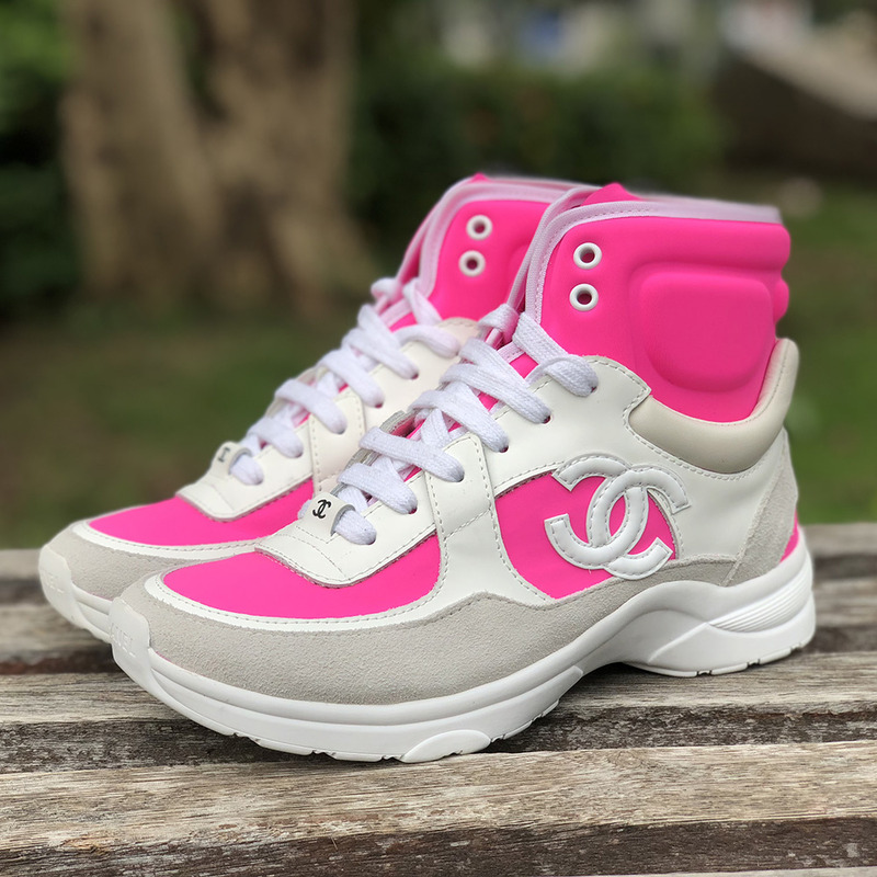 Ch*el high top sneakers in pink and white