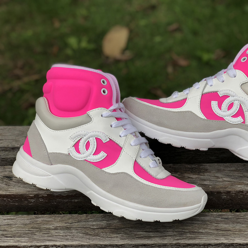 Ch*el high top sneakers in pink and white