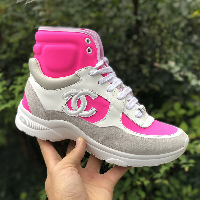 Ch*el high top sneakers in pink and white