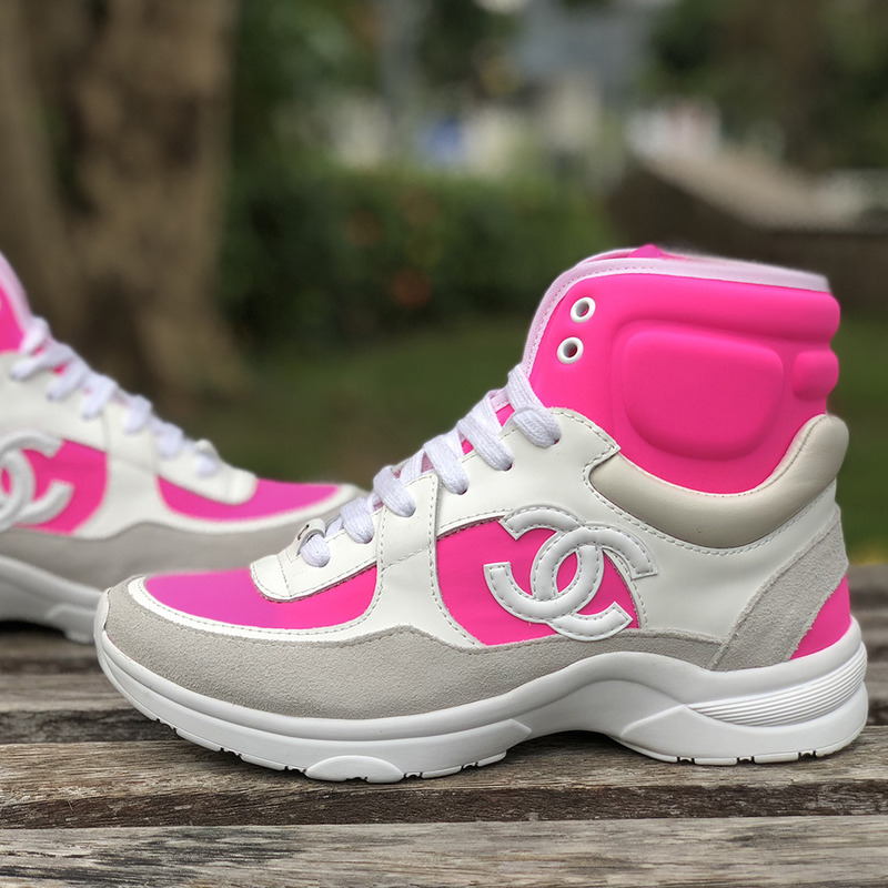 Ch*el high top sneakers in pink and white