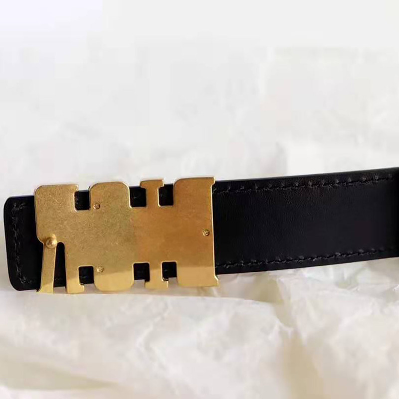 D*or black leather belt with "D*or" buckle