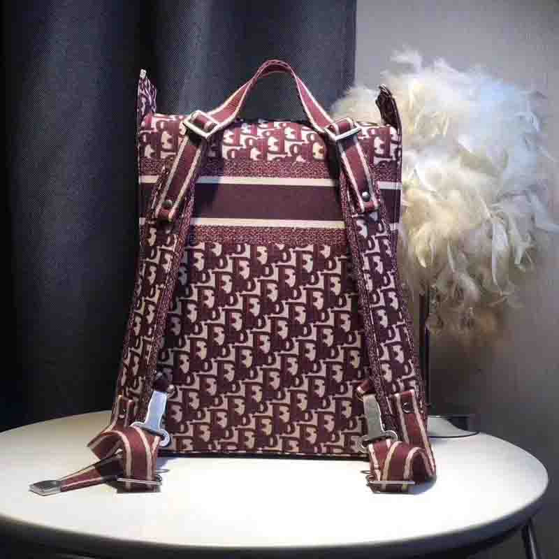 D*or embroidered canvas backpack in wine red