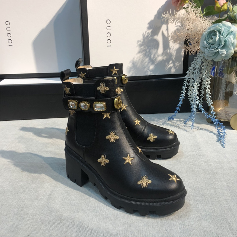 G*u*i embroidered leather ankle boot with belt