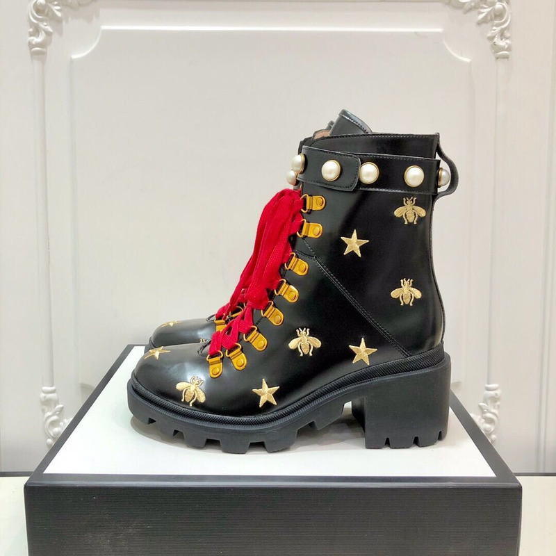 G*u*i embroidered leather ankle boot with belt