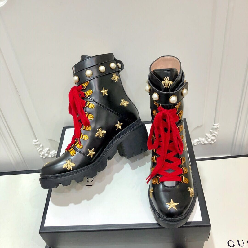 G*u*i embroidered leather ankle boot with belt