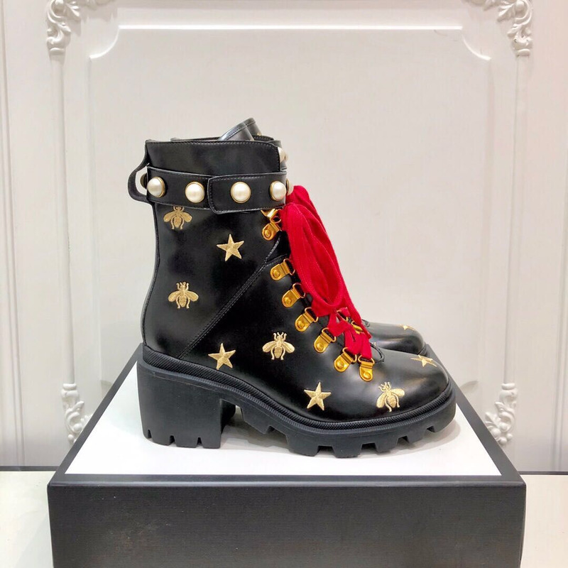 G*u*i embroidered leather ankle boot with belt