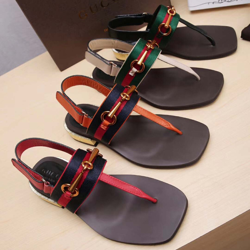 G*u*i web horsebit thong sandals