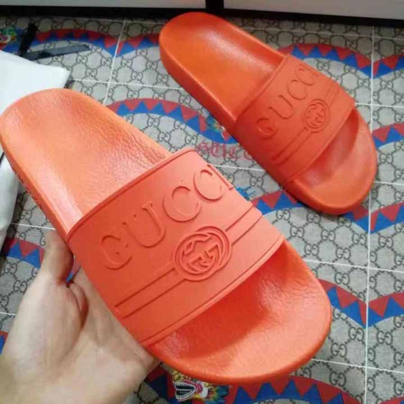 rubber G*u*i slide sandal in orange