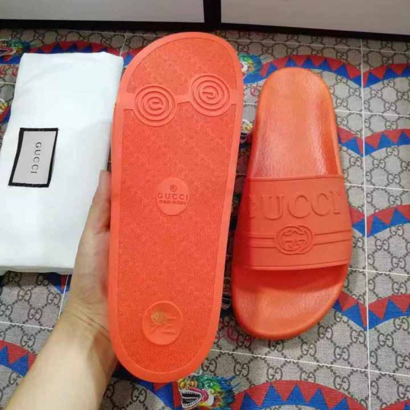 rubber G*u*i slide sandal in orange