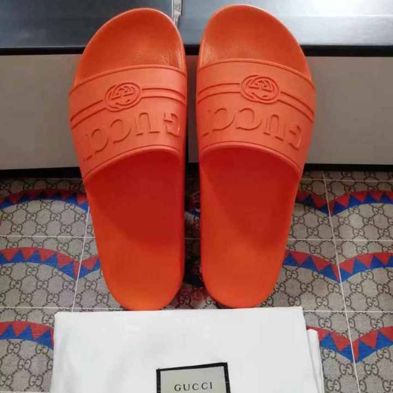 rubber G*u*i slide sandal in orange