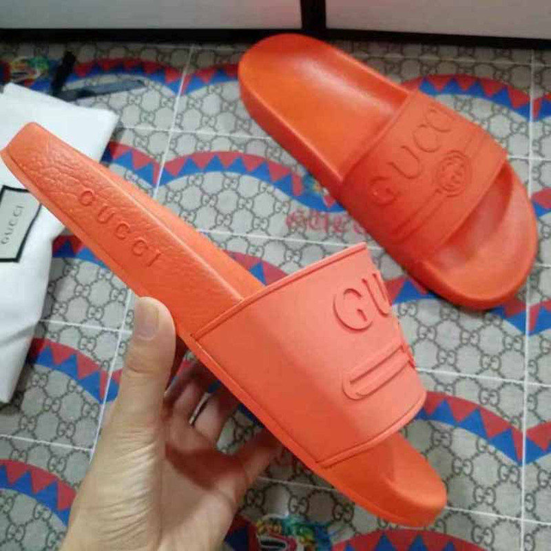 rubber G*u*i slide sandal in orange