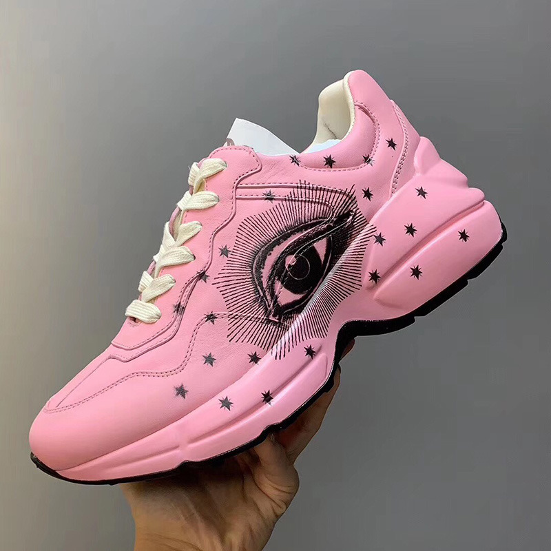 G*u*i pink leather sneaker with black eyes