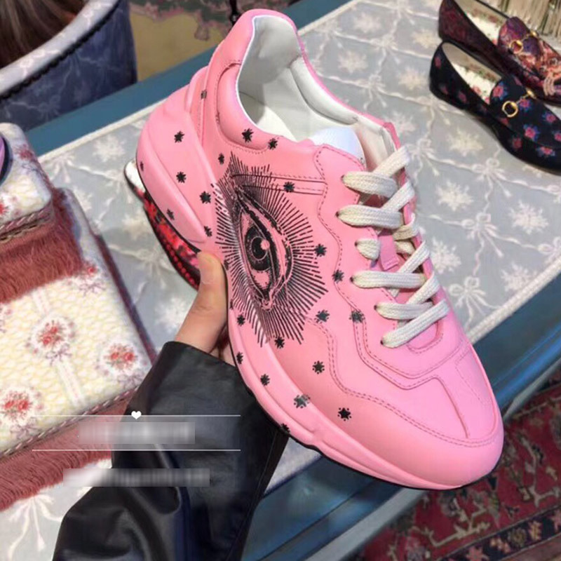 G*u*i pink leather sneaker with black eyes