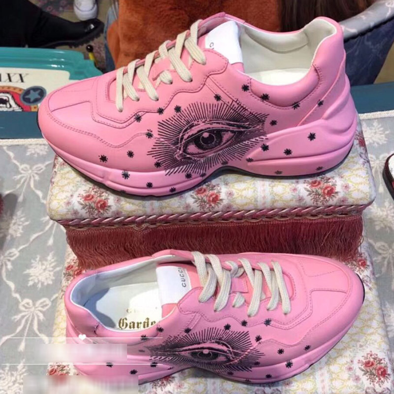 G*u*i pink leather sneaker with black eyes