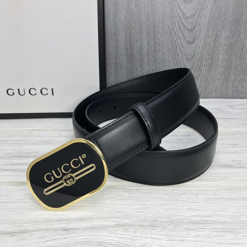 G*u*i leather belt with print buckle