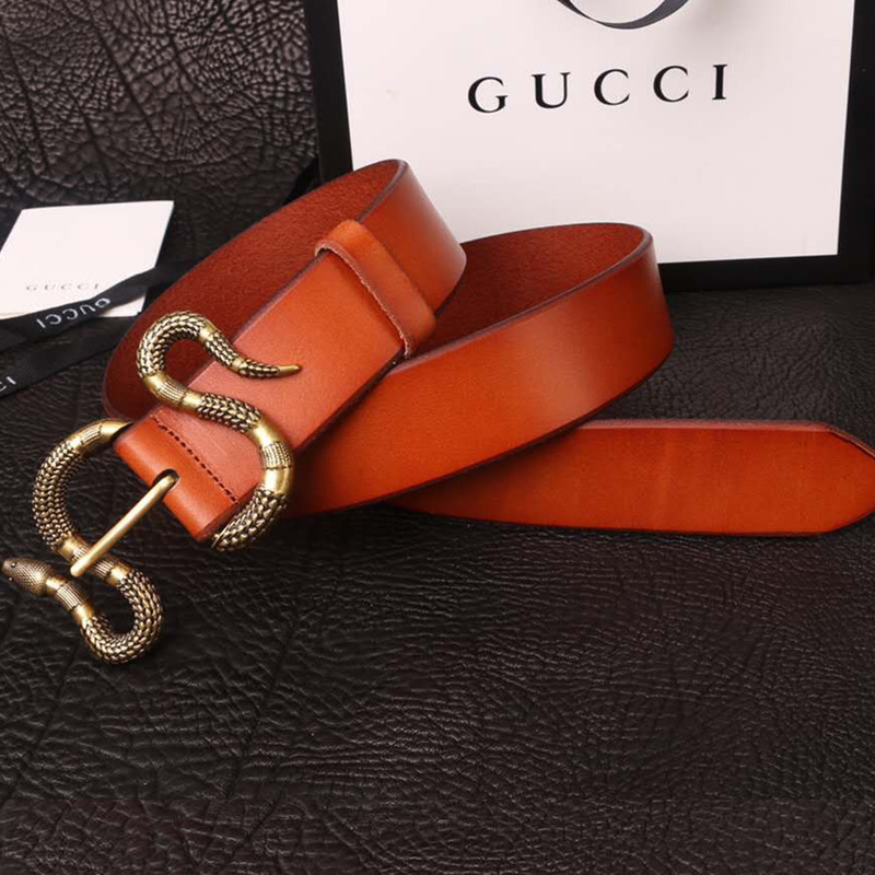 G*u*i orange leather belt with snake buckle