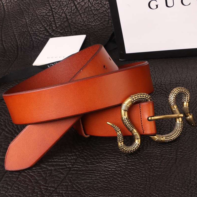 G*u*i orange leather belt with snake buckle