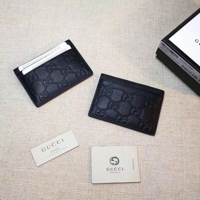 G*u*i signature money clip