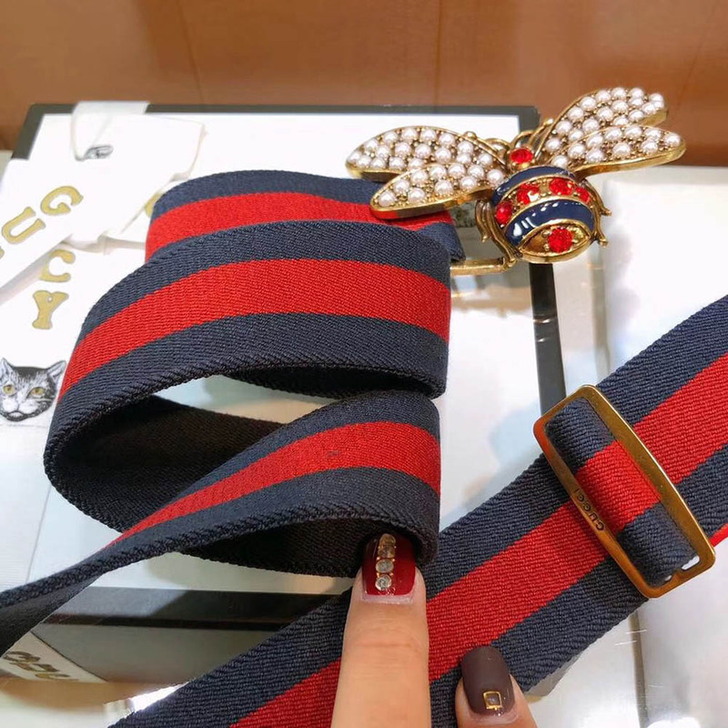 G*u*i red and blue web belt with bee(red pearl and crystal )