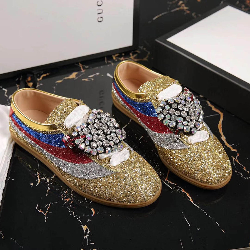 G*u*i falacer glitter sneaker with web in gold