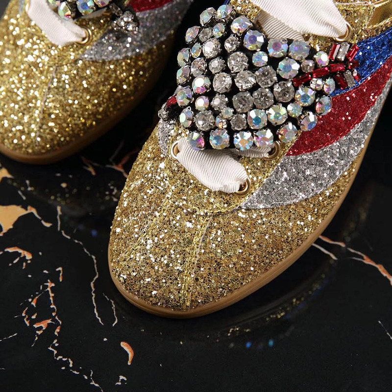 G*u*i falacer glitter sneaker with web in gold