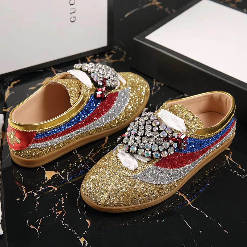 G*u*i falacer glitter sneaker with web in gold