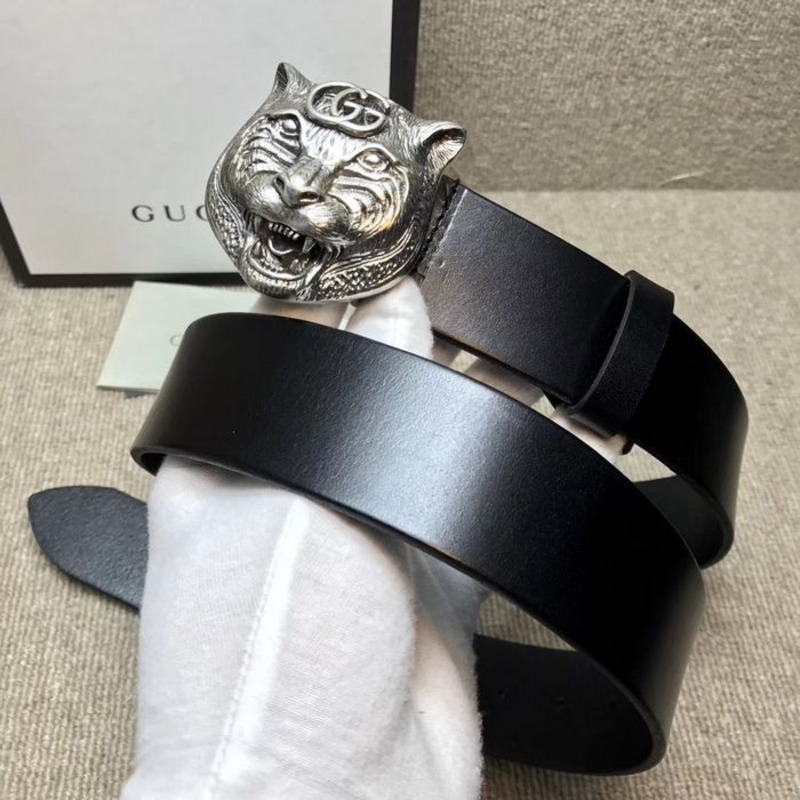 G*u*i leather belt with silver feline head