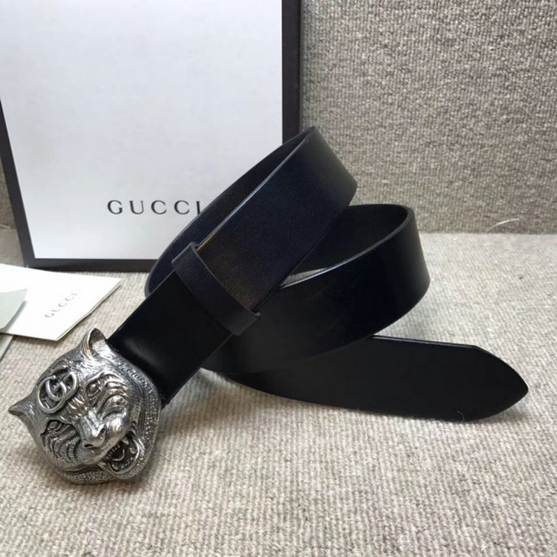 G*u*i leather belt with silver feline head