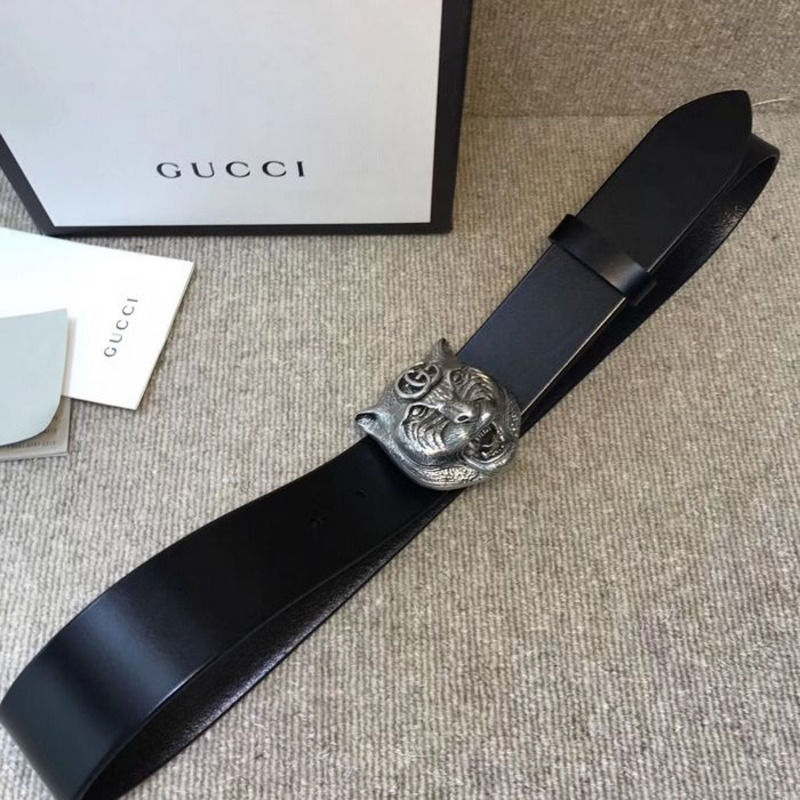 G*u*i leather belt with silver feline head