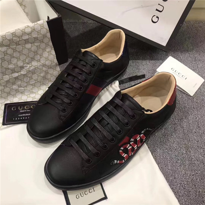 G*u*i designed black snake sneakers