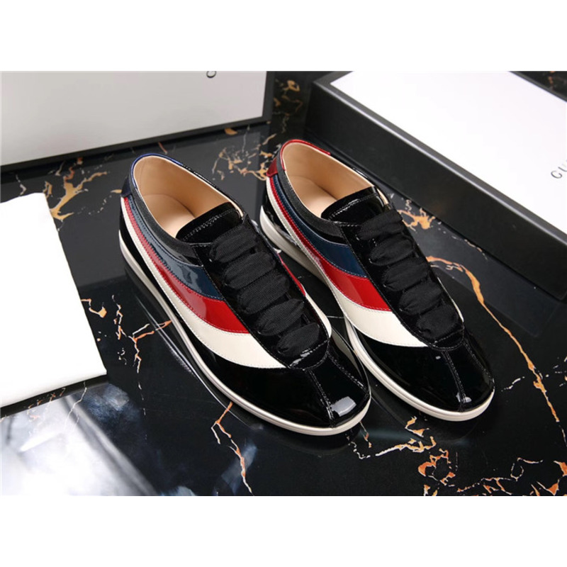 G*u*i patent leather low-top sneakers with web