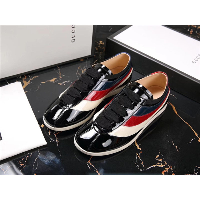 G*u*i patent leather low-top sneakers with web