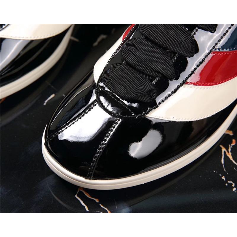 G*u*i patent leather low-top sneakers with web