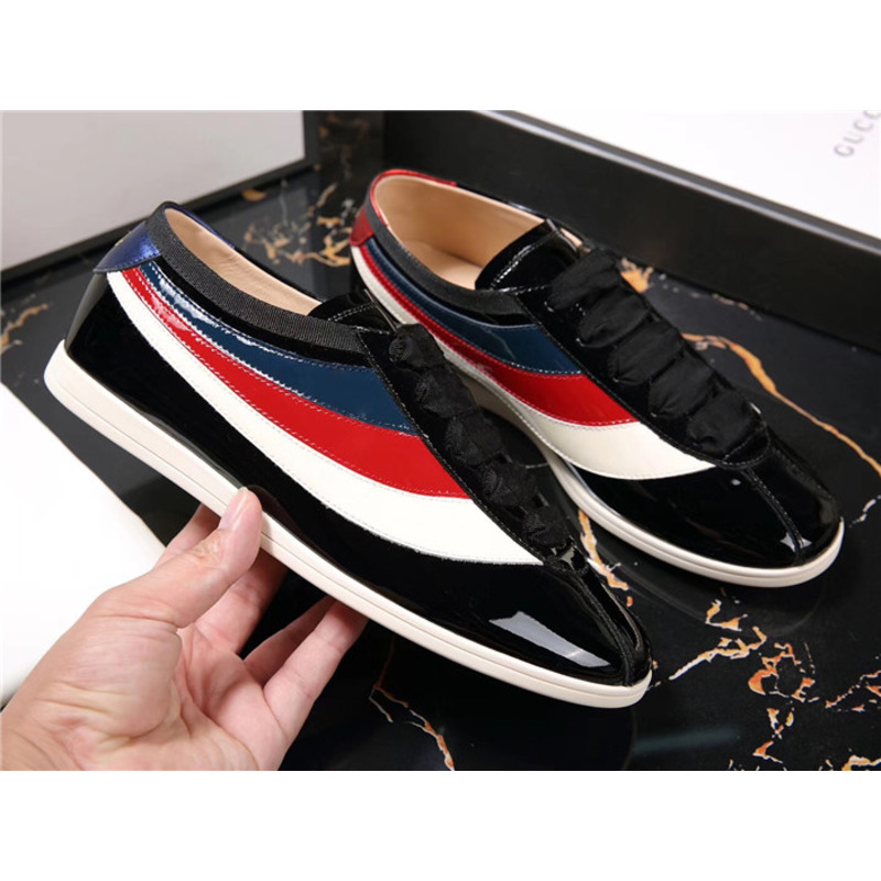 G*u*i patent leather low-top sneakers with web