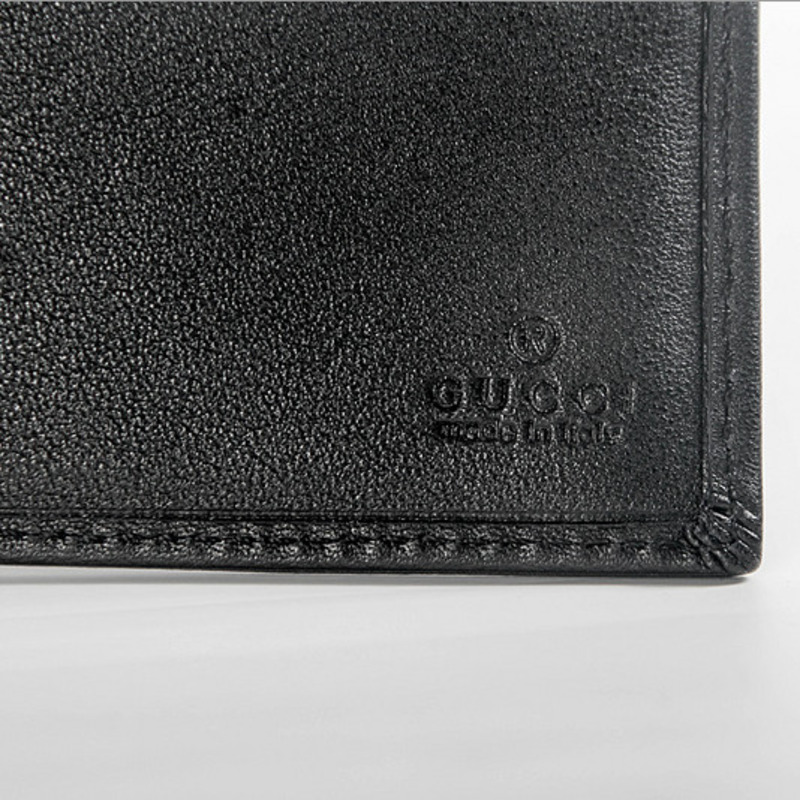 G*u*i black leather wallet