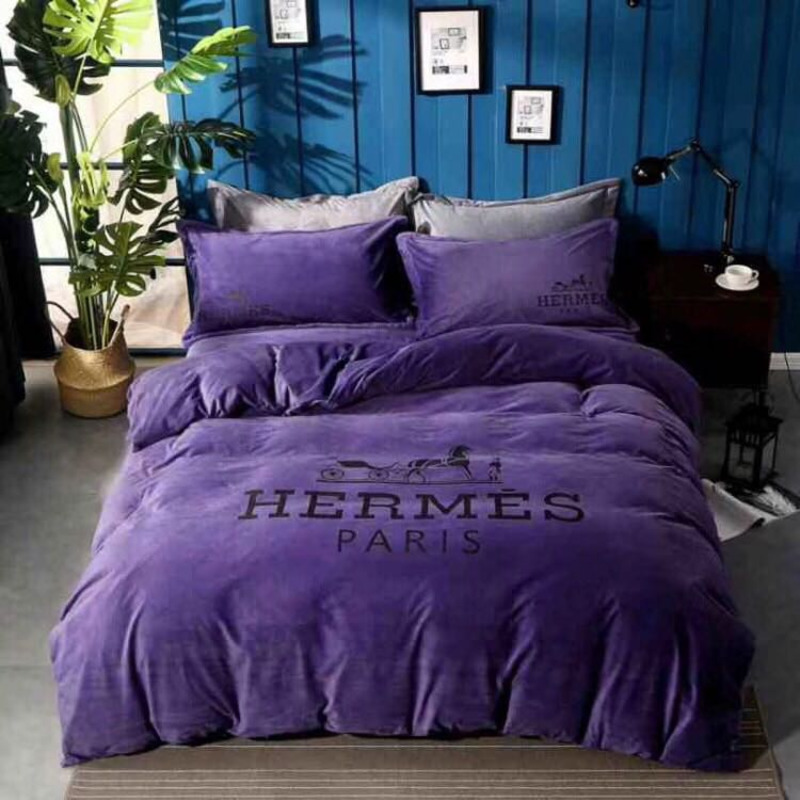 H**mes four piece suit bedding