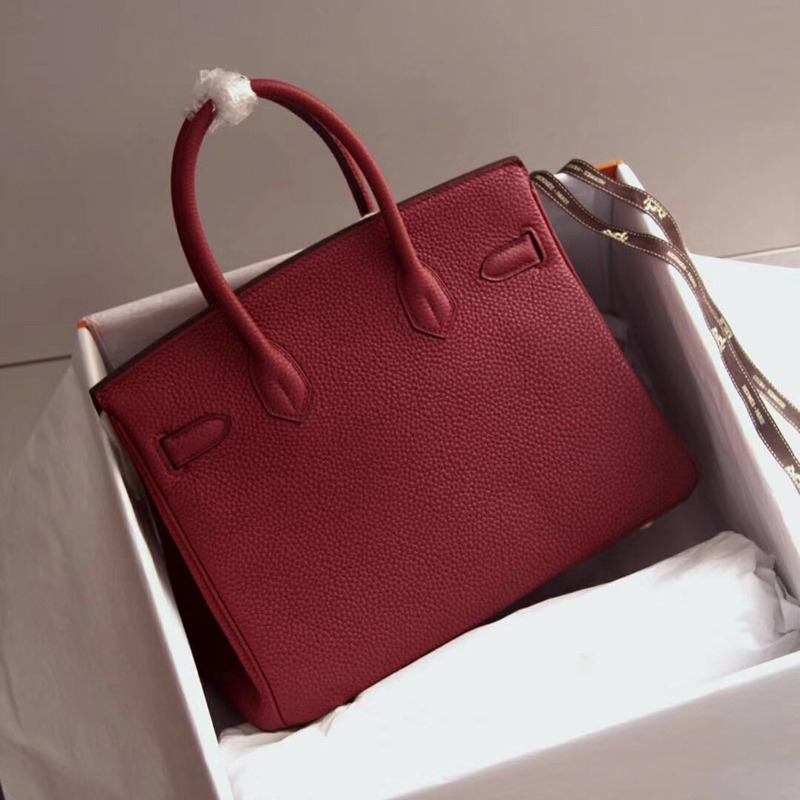 H**mes women bag in red