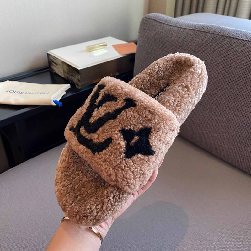 l**is V*t*n monogram shearling slippers