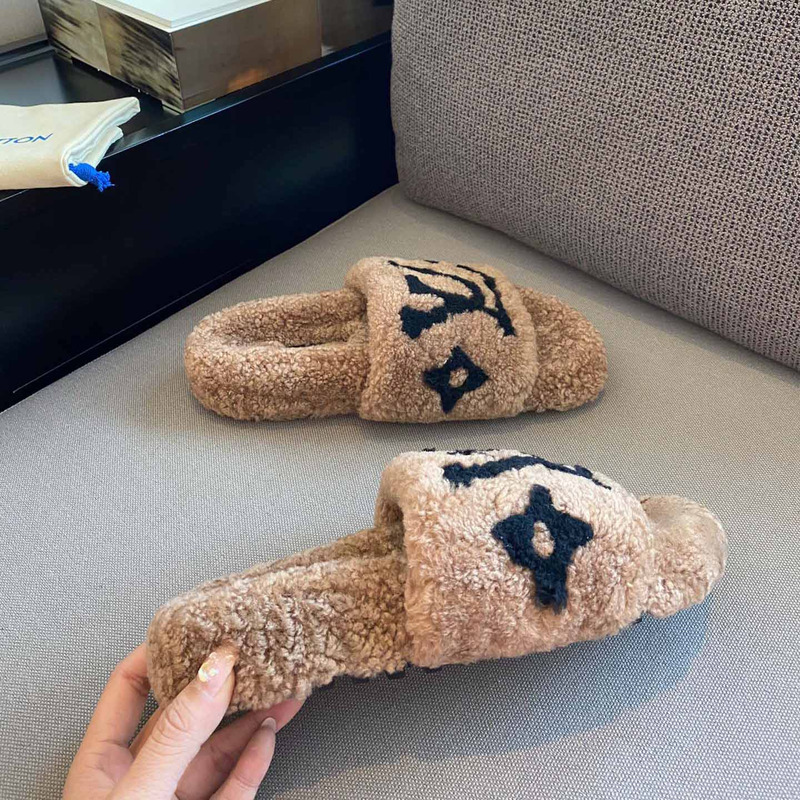 l**is V*t*n monogram shearling slippers