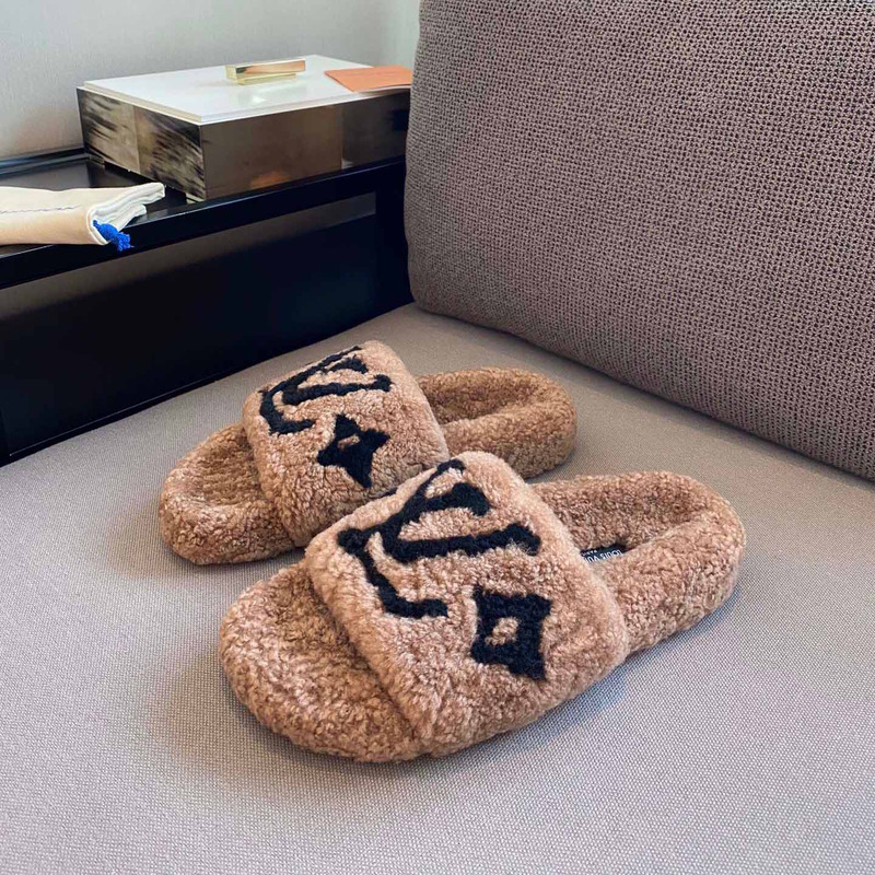 l**is V*t*n monogram shearling slippers